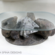 Image for article titled I Need This Millennium Falcon Asteroid Field Coffee Table In My Life